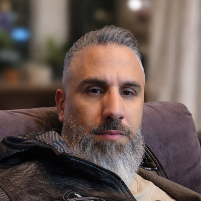 Omar sitting on a gaming chair